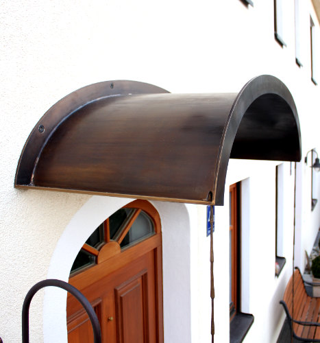 vordach schmiedebronze