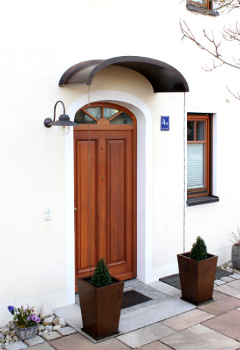 vordach schmiedebronze